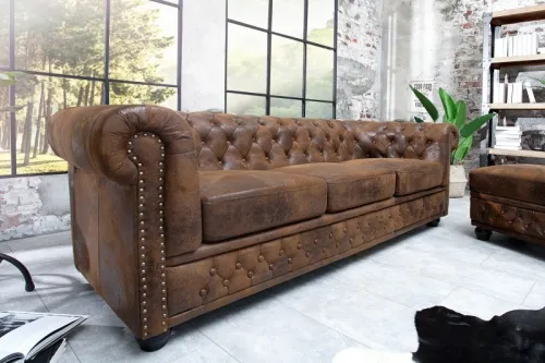 Estila Luxusná vintage hnedá sedačka Antik s chesterfield prešívaním z kože s nitmi s čiernymi nožičkami 205 cm