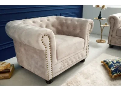 Estila Luxusné chesterfield kreslo Contessa s čalúnením vo farbe šampanského s prešívaním a kovovým zdobením 105cm