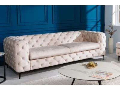 Estila Zamatová čalúnená sedačka Limonny v krémovej farbe champagne v modernom barokovom štýle 235cm