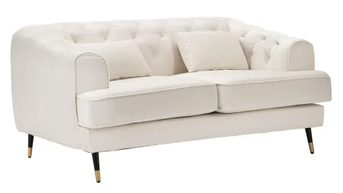 Estila Art deco dvojmiestna čalúnená zamatová krémová sedačka Lana s čiernymi nožičkami so zlatými detailmi 146 cm