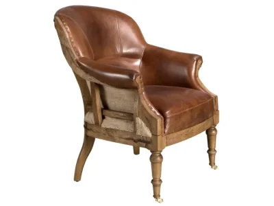 Estila Luxusné vintage kreslo Arachio s koňakovo hnedým poťahom z pravej kože s vyrezávaným masívnym rámom 93 cm